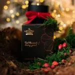 The Greatest Candle in the World Bougie parfumée en verre noir (170 g) - fleur de darjeeling
